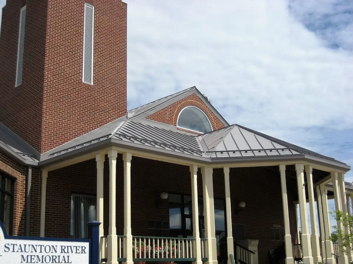 Skilled roofing craftsmen working on a residential roof in Windsor Park